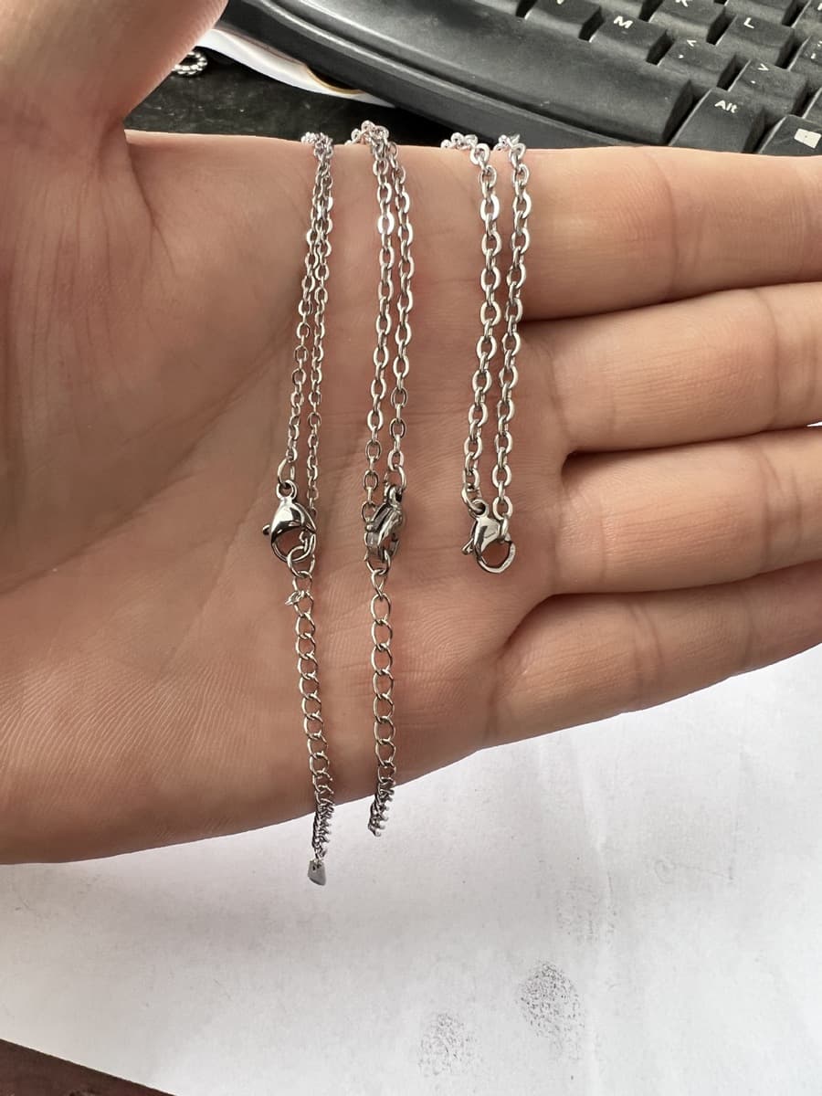 Производители напрямую поставляются с титановой стальной собачьей биркой из нержавеющей стали